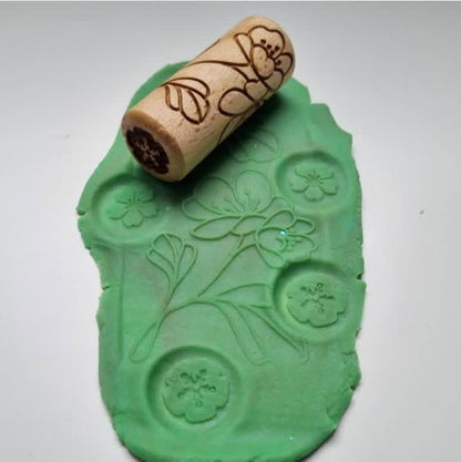 Petit rouleau sensoriel en bois - 4 modèles